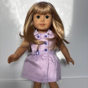 American Girl doll with 6 outfits